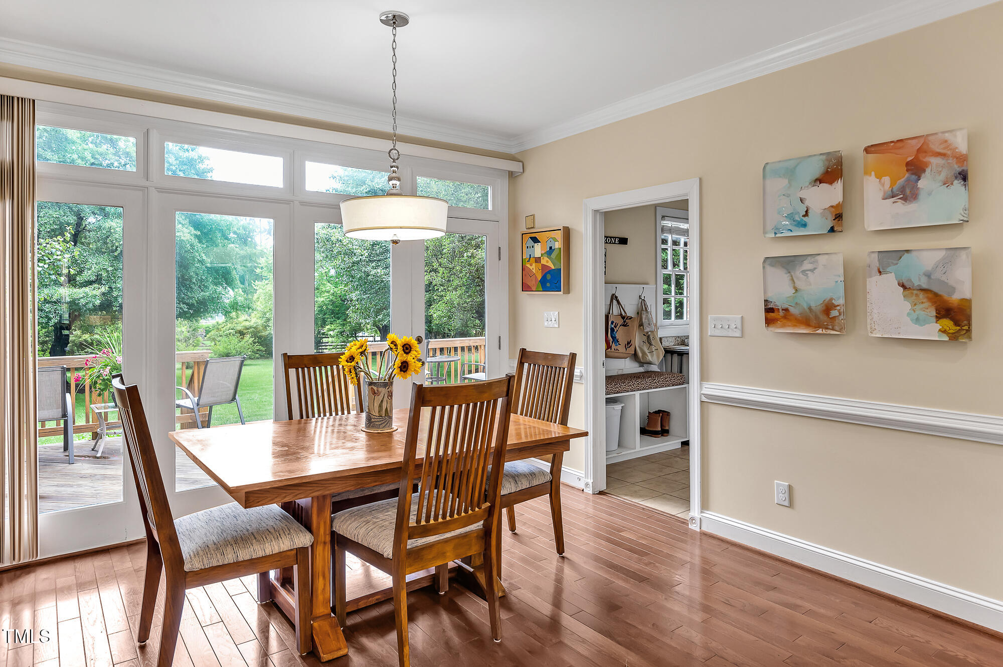 14 Marigold Place Durham, NC 27705 - Photo 16 of 32 a dining room with furniture a chandelier and wooden floor