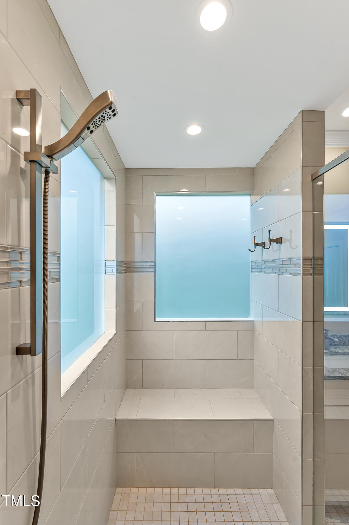 14 Marigold Place Durham, NC 27705 - Photo 21 of 32 a bathroom with a bathtub and a shower