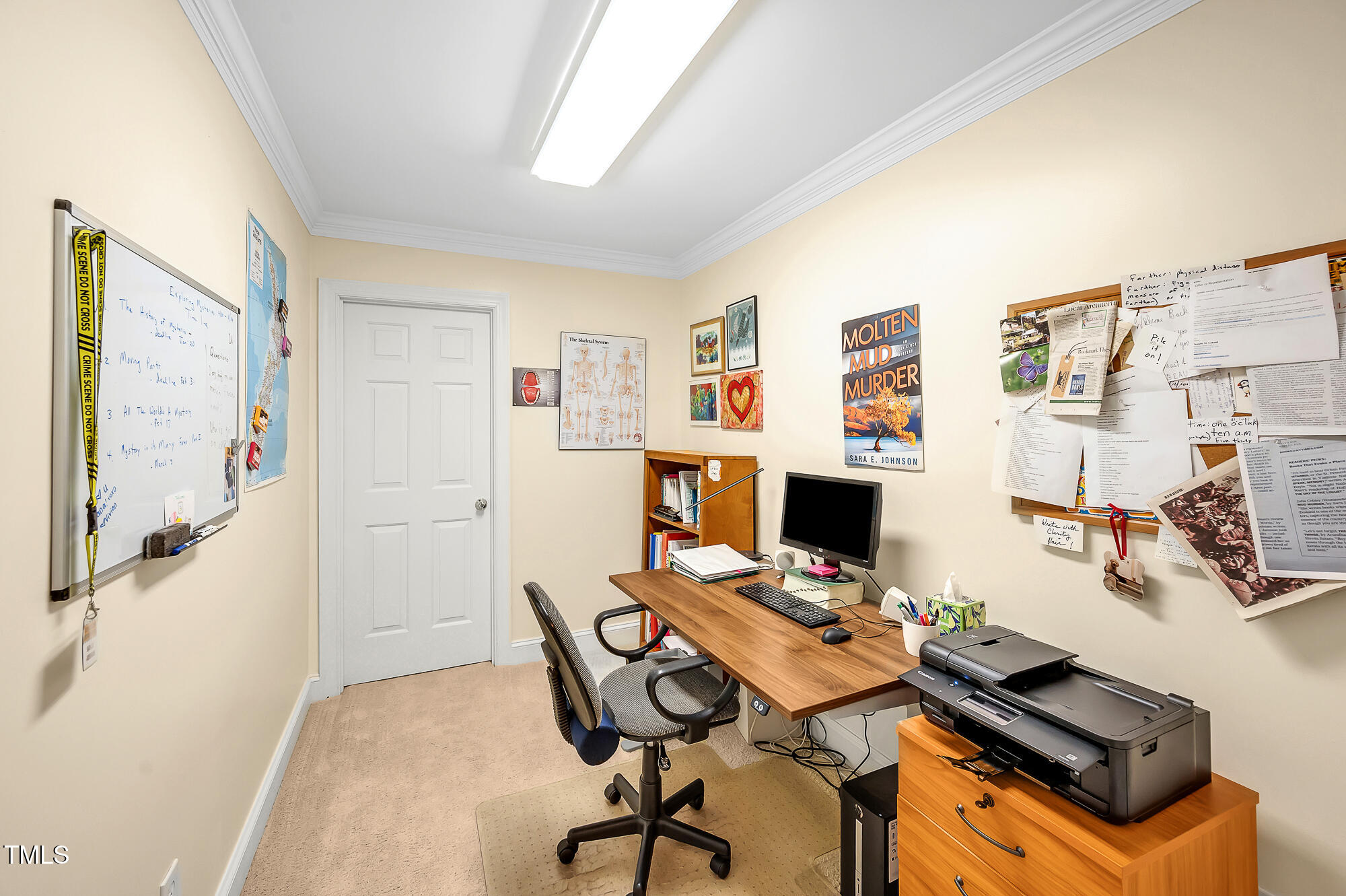 14 Marigold Place Durham, NC 27705 - Photo 28 of 32 a view of a workspace with furniture and a window