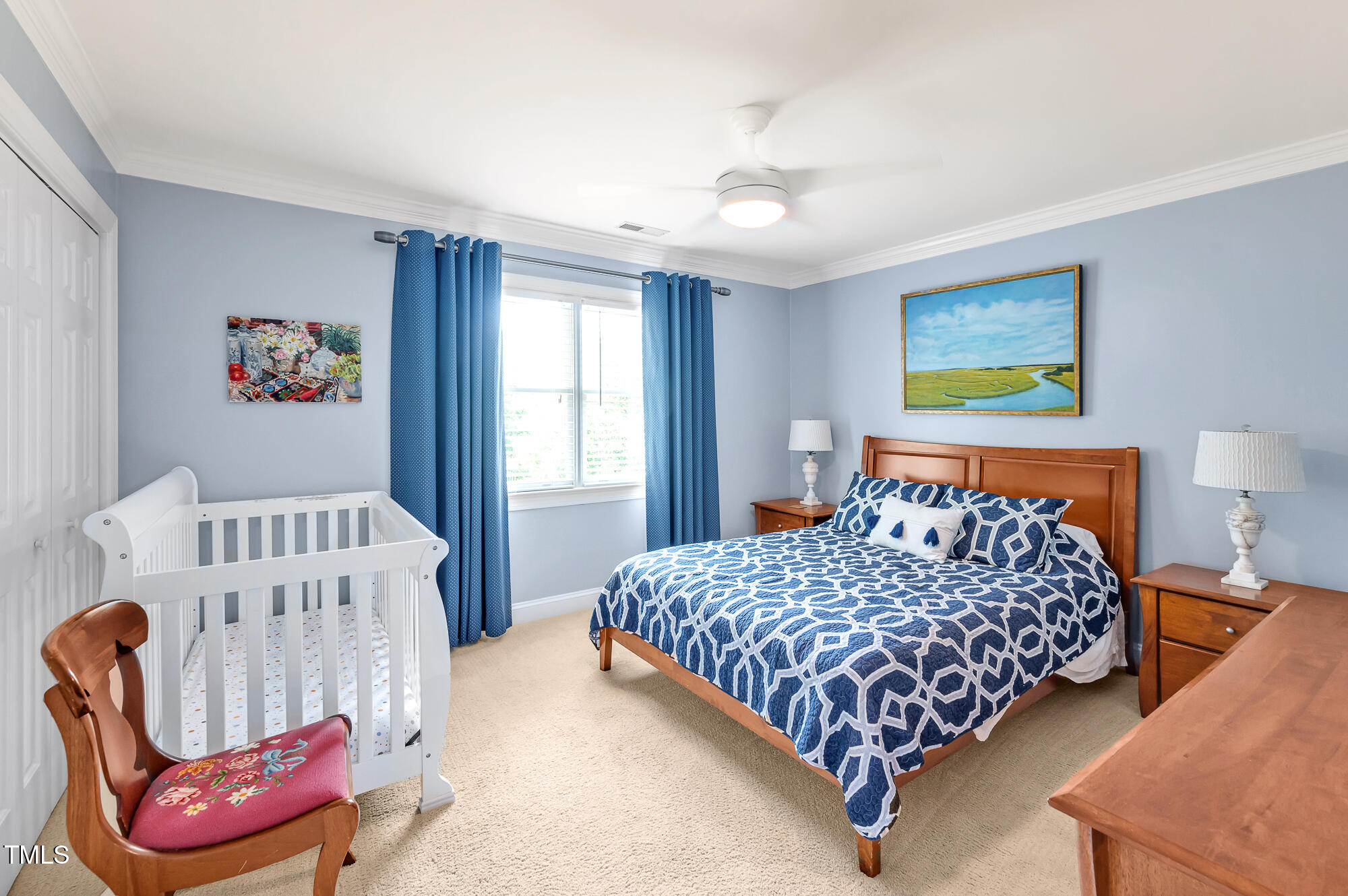 14 Marigold Place Durham, NC 27705 - Photo 29 of 32 a bedroom with a bed and a chair