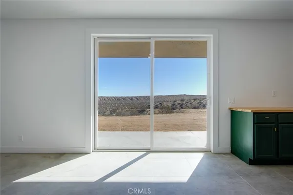 an empty room with a workbench