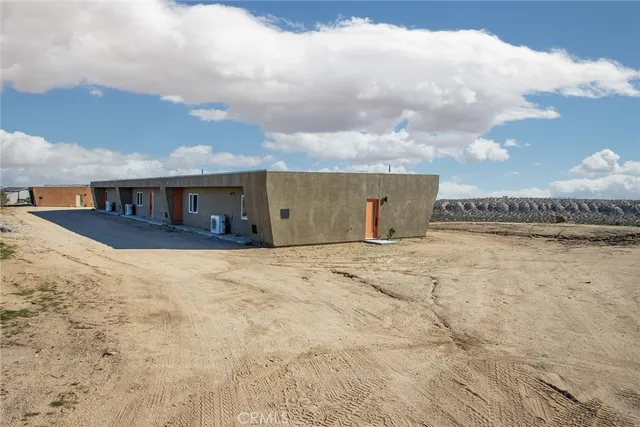 a view of a terrace with wooden fence