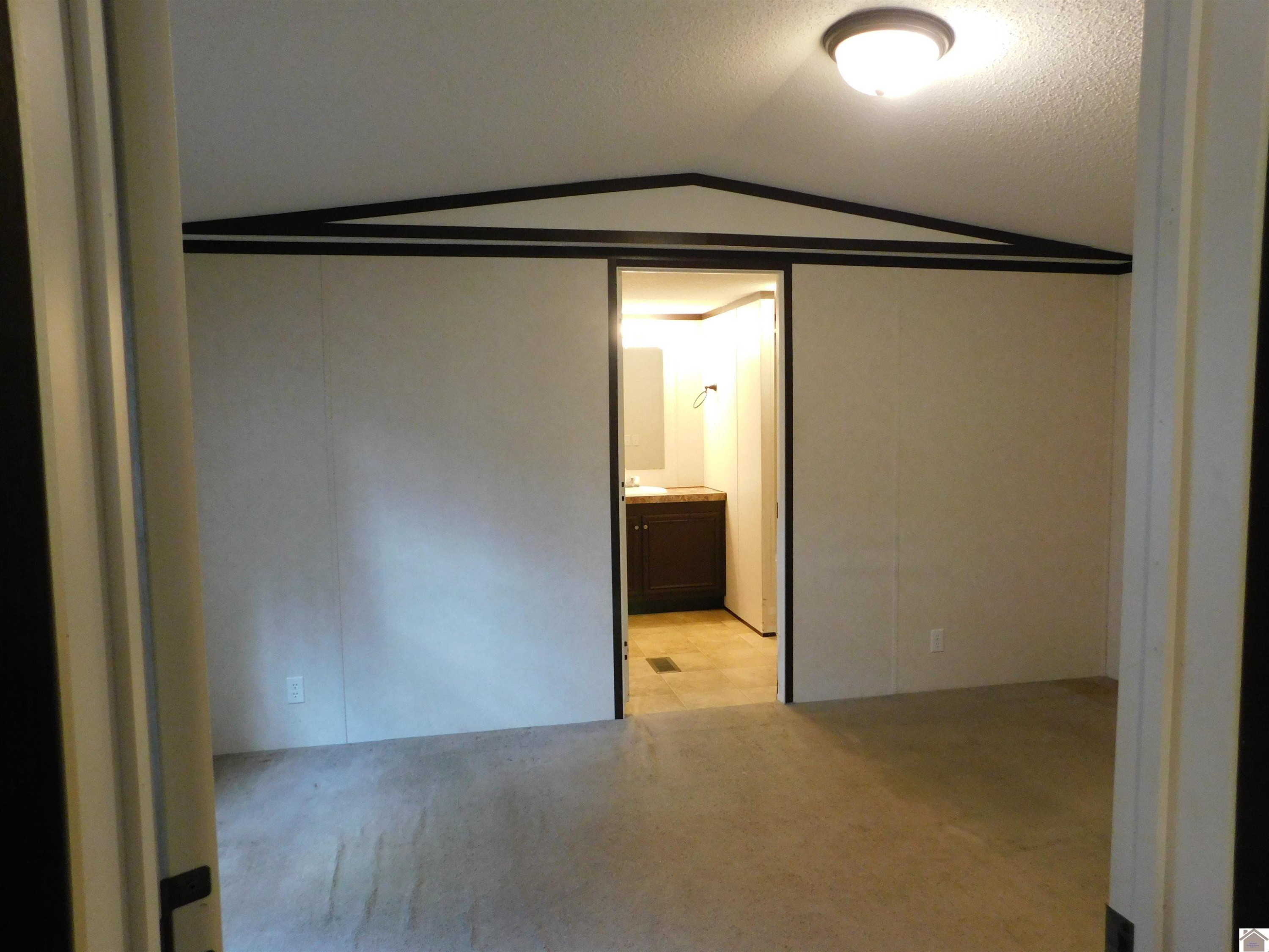 715 Lantrip Road Grand Rivers, KY 42045 - Photo 12 of 23 Master Bedroom