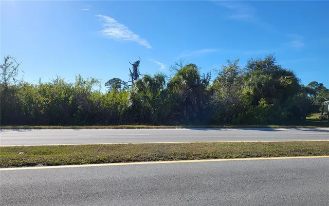a view of street with houses
