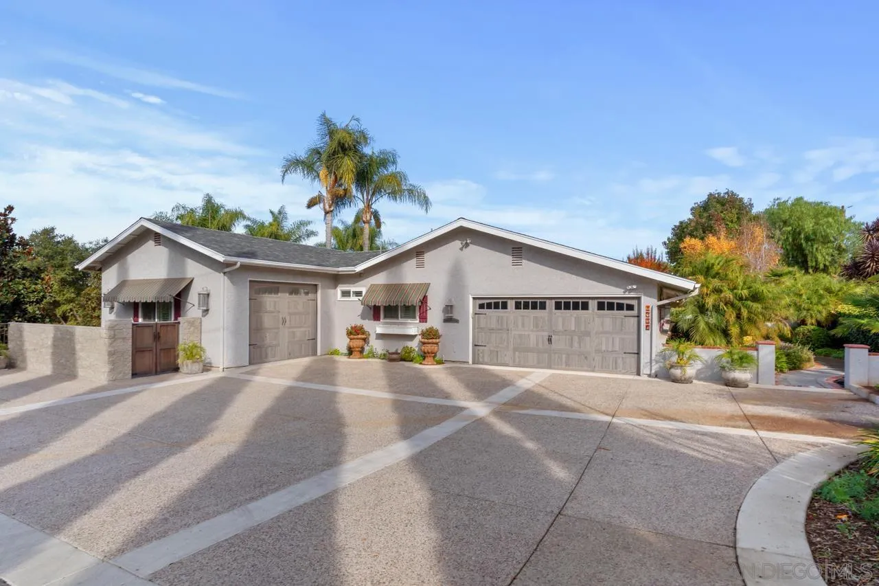 1346 El Nido Drive Fallbrook, CA 92028 - Photo 2 of 75 a front view of a house with a yard and garage