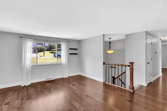 a view interior of a house with wooden floor and windows