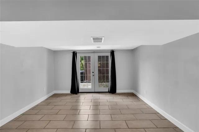 a view of an empty room with window