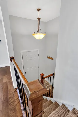 a view of a hallway with seating space