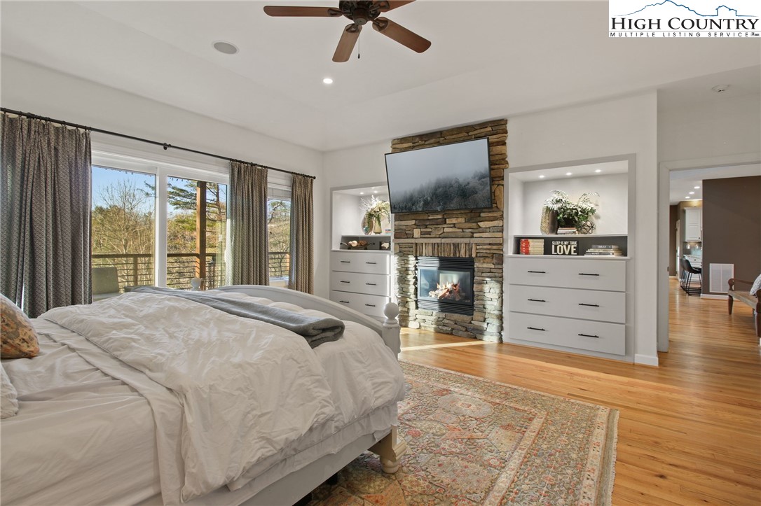 140 Gentry Road Boone, NC 28607 - Photo 14 of 49 a bedroom with a bed and furniture