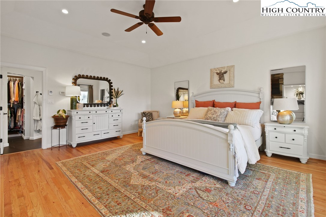 140 Gentry Road Boone, NC 28607 - Photo 15 of 49 a bed room with a bed and a television