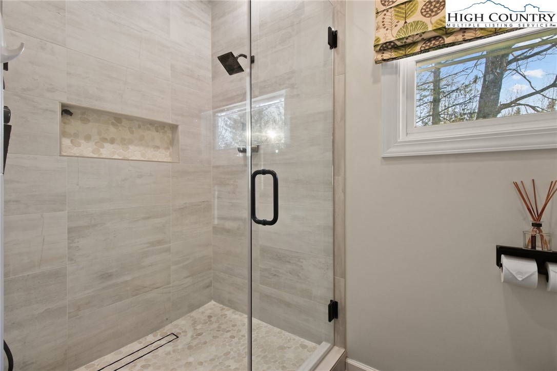 140 Gentry Road Boone, NC 28607 - Photo 18 of 49 a bathroom with a shower