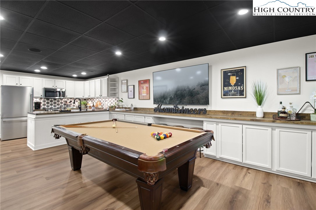 140 Gentry Road Boone, NC 28607 - Photo 32 of 49 a room with table tennis and ceiling fan