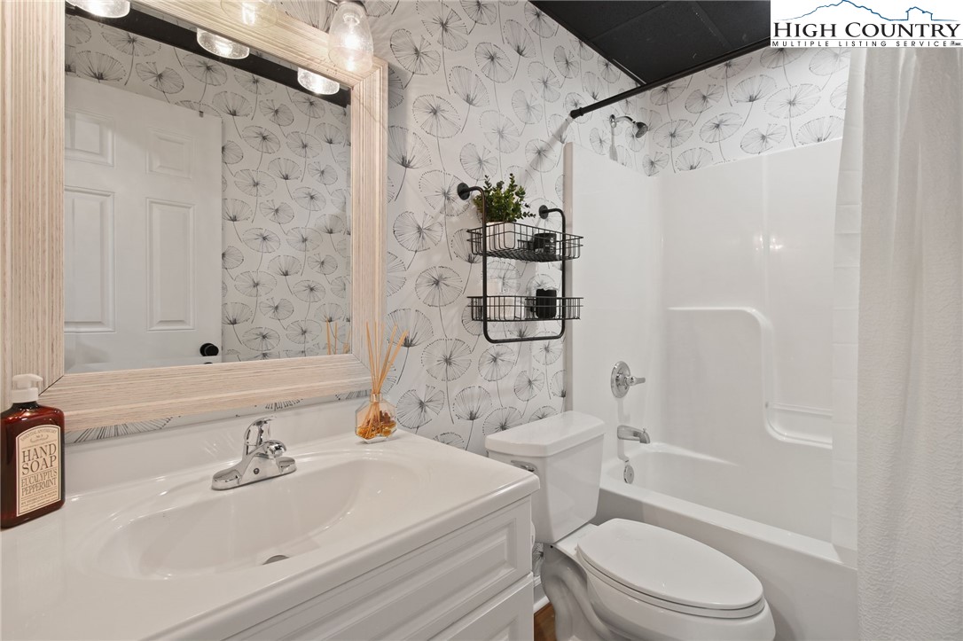 140 Gentry Road Boone, NC 28607 - Photo 35 of 49 a bathroom with a sink toilet and shower