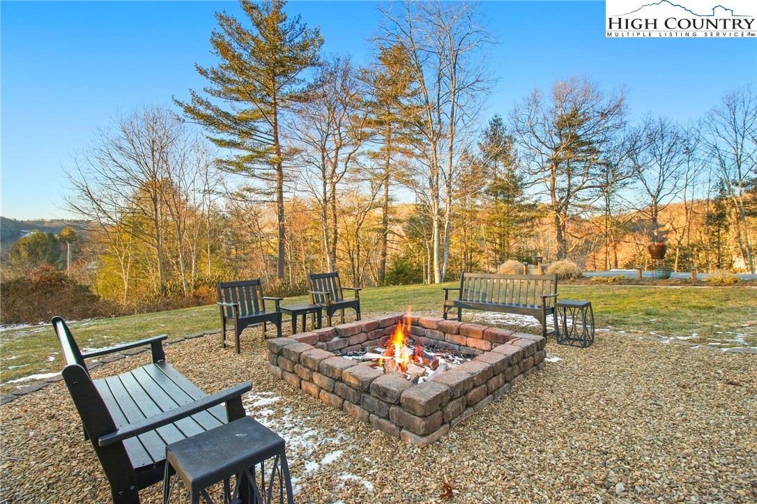 140 Gentry Road Boone, NC 28607 - Photo 45 of 49 a view of a backyard with sitting area