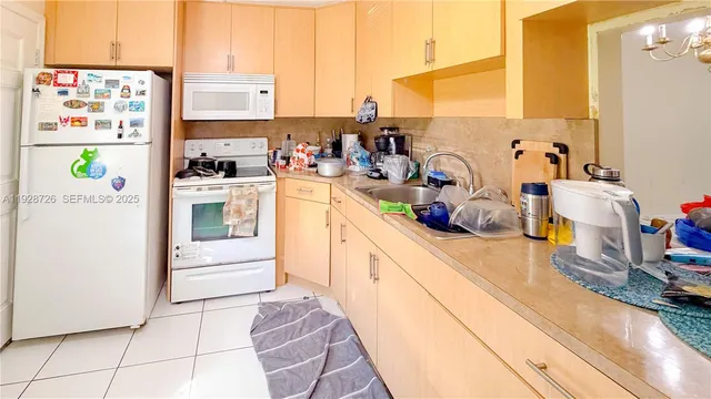 $215,000 | 1101 Northeast 191st Street, Unit H108, Miami, FL 33179