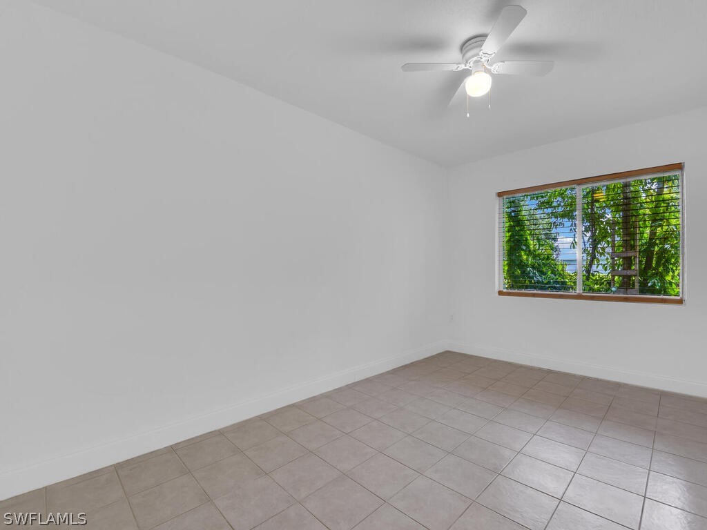 915 Alderman Street Fort Myers, FL 33916 - Photo 14 of 20 an empty room with a window