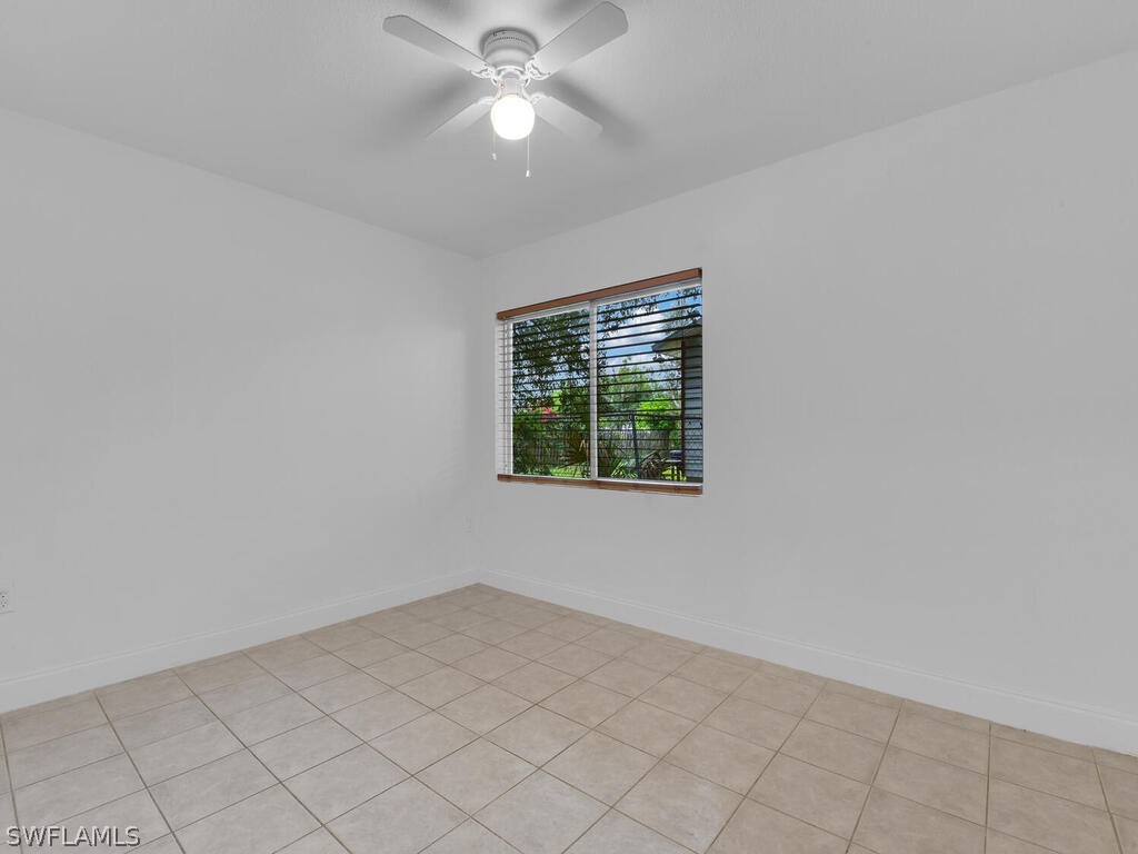 915 Alderman Street Fort Myers, FL 33916 - Photo 18 of 20 an empty room with a window