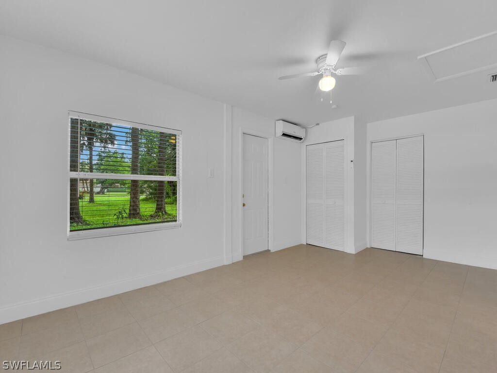 915 Alderman Street Fort Myers, FL 33916 - Photo 10 of 20 a view of an empty room with a window