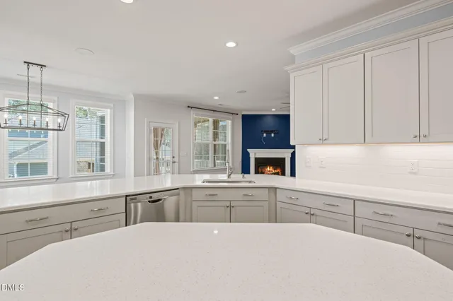 a view of a house with a snow in the yard