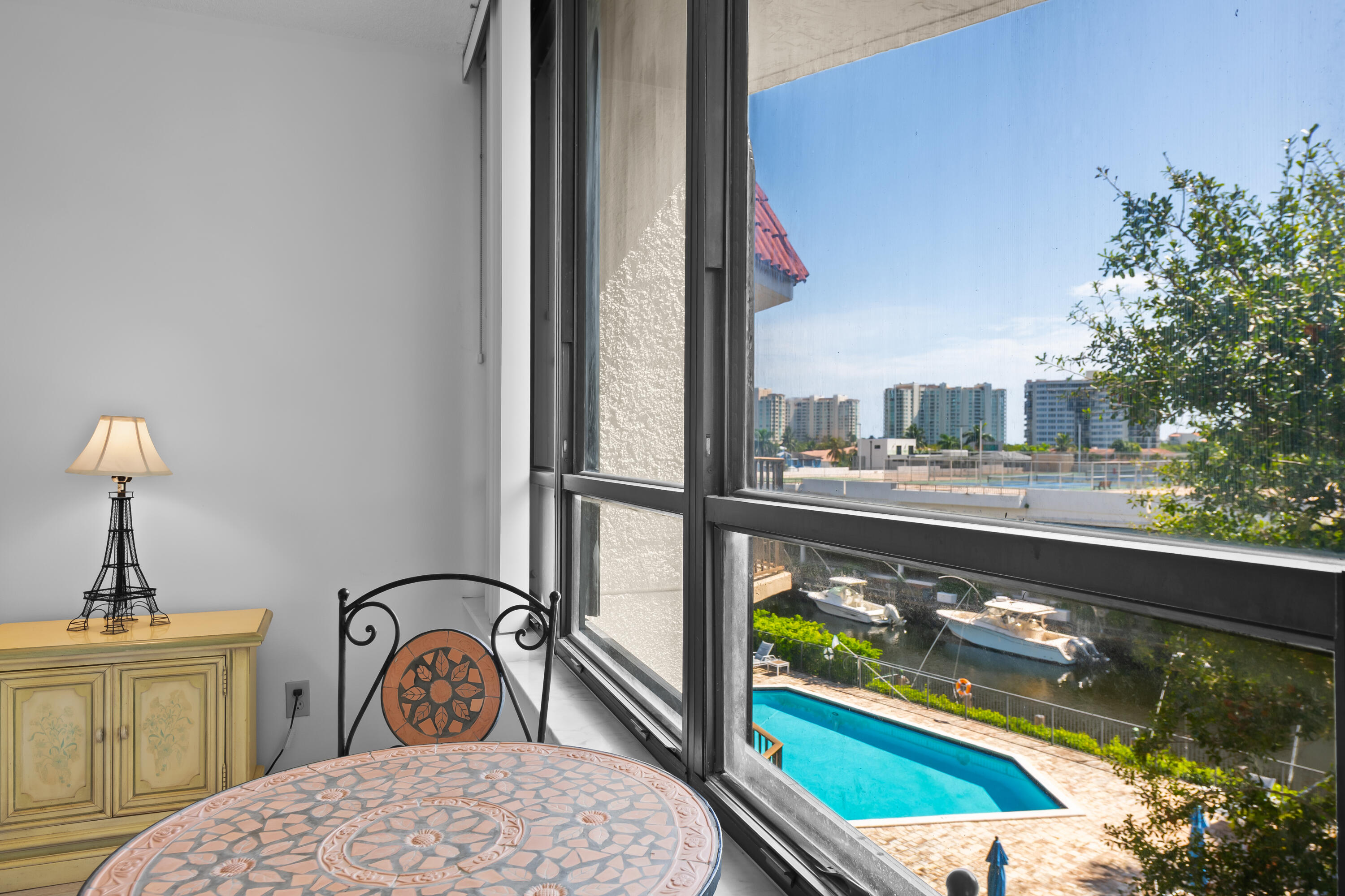 799 Jeffery Street, Unit 411 Boca Raton, FL 33487 - Photo 21 of 37 a view of a balcony and a potted plant