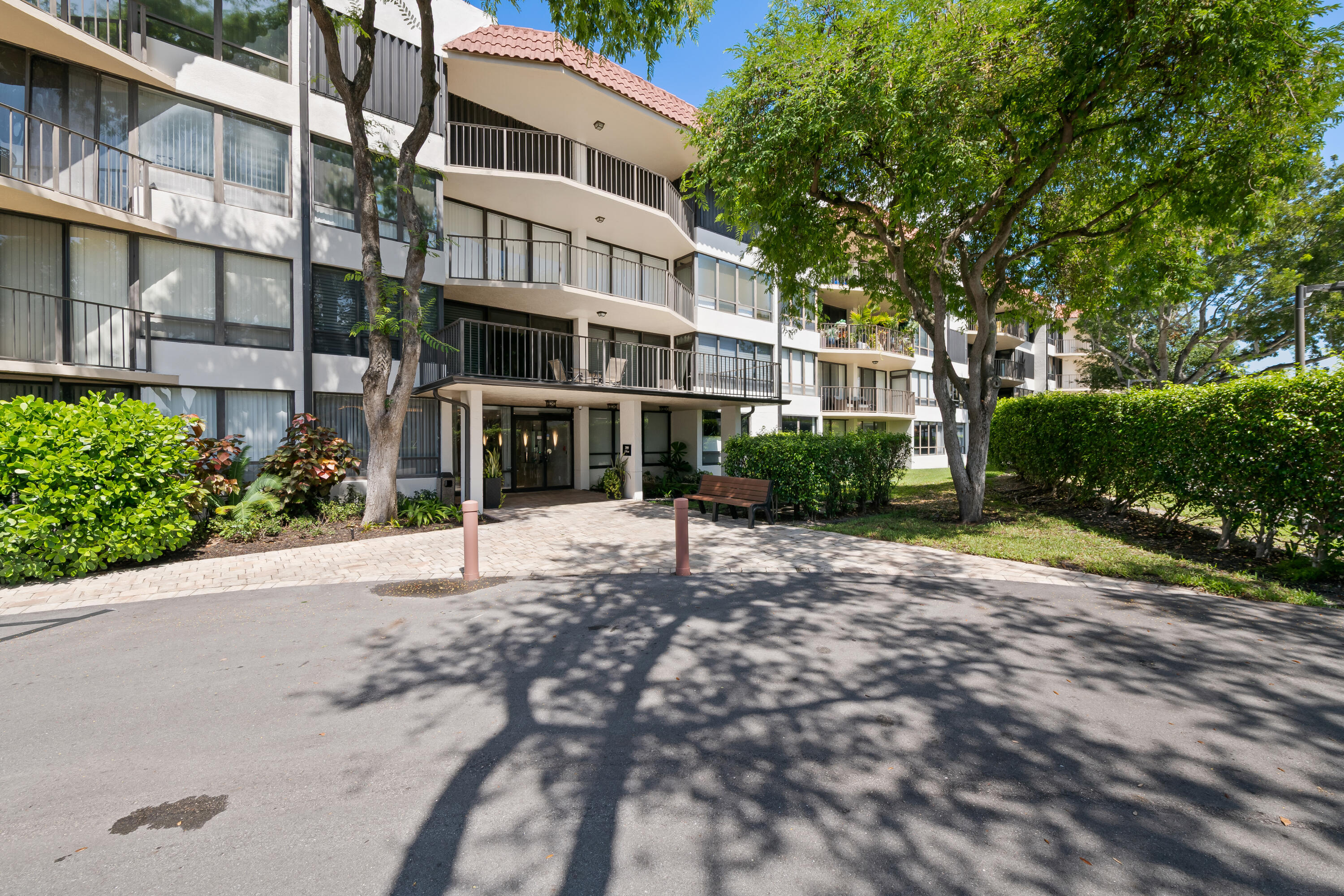 799 Jeffery Street, Unit 411 Boca Raton, FL 33487 - Photo 37 of 37 a view of a building with a yard