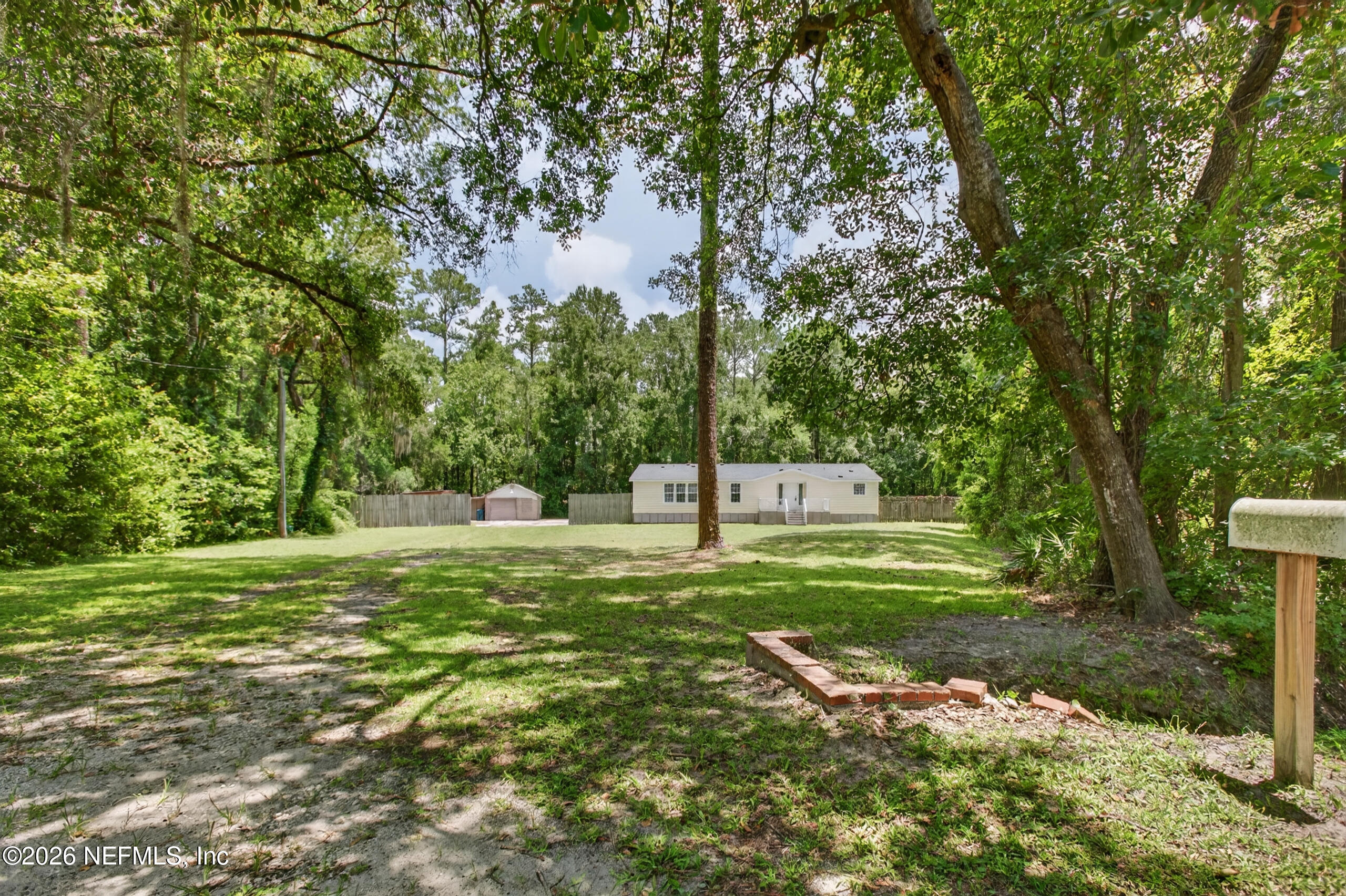2817 Haddock Road Jacksonville, FL 32218 - Photo 2 of 77 From Haddock Rd to Driveway