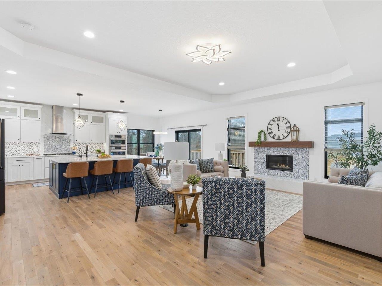 6817 Timber Court Bettendorf, IA 52722 - Photo 11 of 64 a living room with furniture and a fireplace