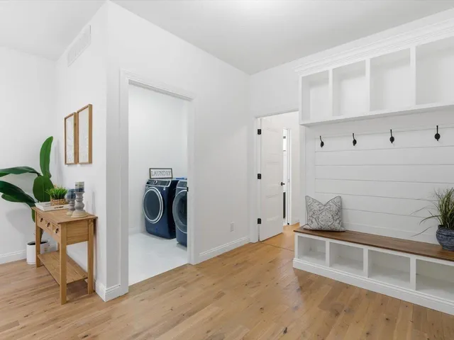 a bathroom with a shower and a bath tub
