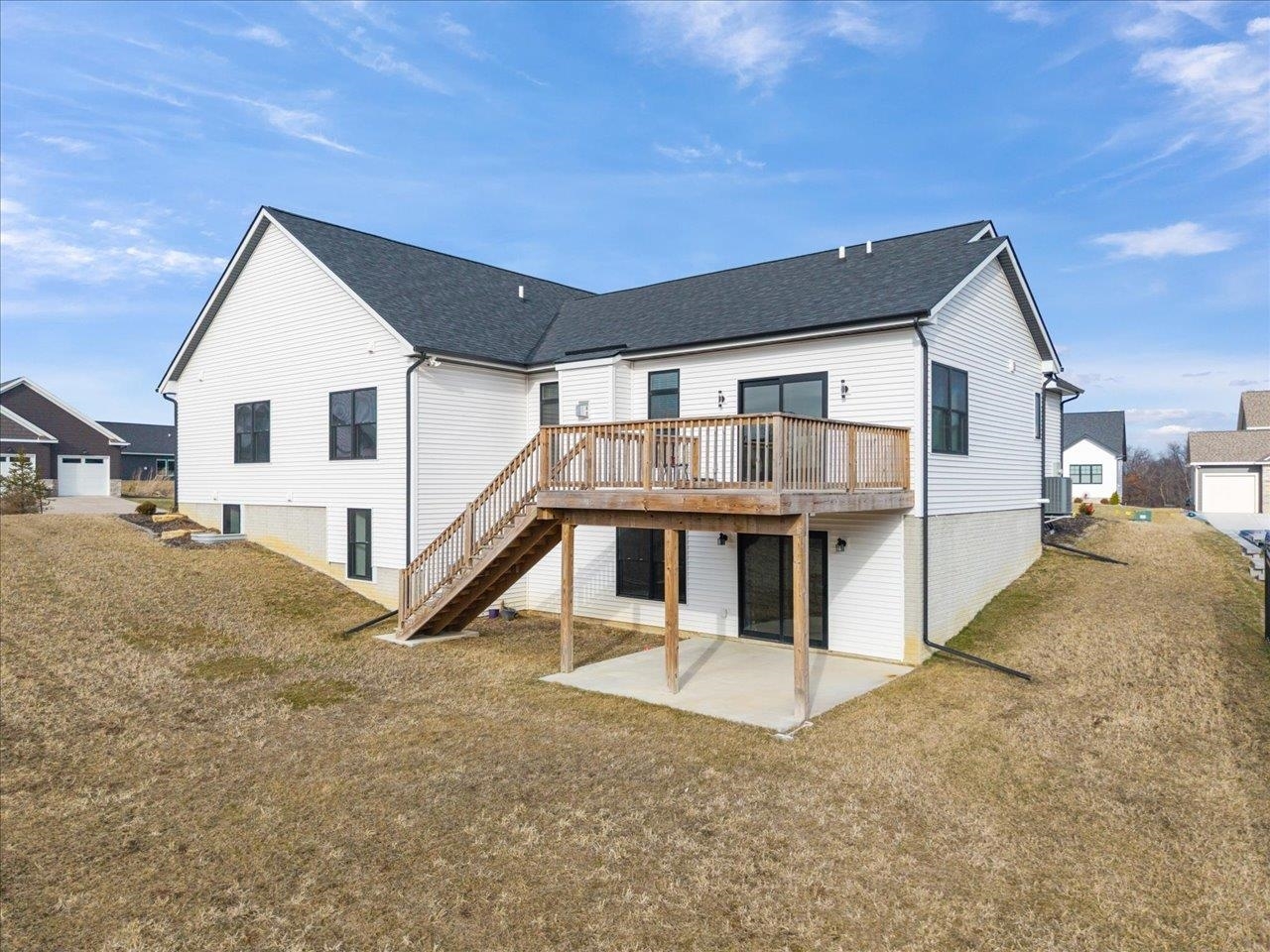 6817 Timber Court Bettendorf, IA 52722 - Photo 57 of 64 a house view with a outdoor space