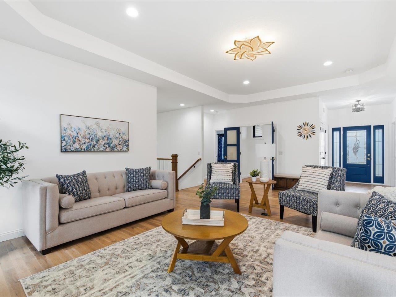 6817 Timber Court Bettendorf, IA 52722 - Photo 9 of 64 a living room with furniture and a dining table
