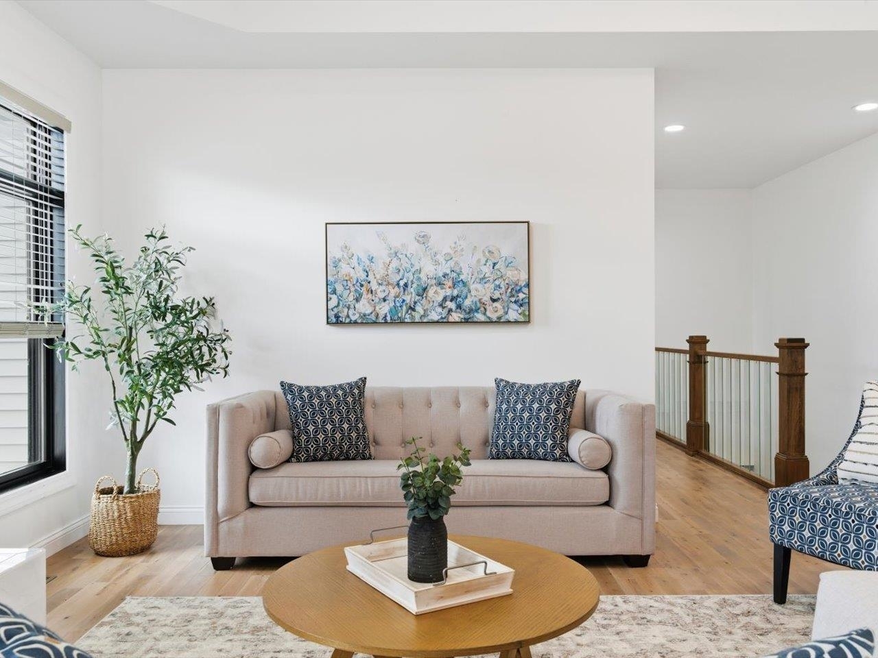6817 Timber Court Bettendorf, IA 52722 - Photo 10 of 64 a living room with furniture potted plant and a window