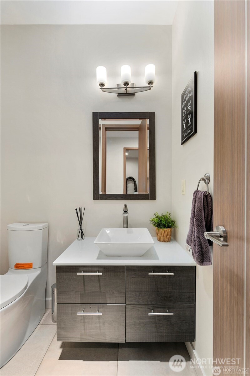 30404 28th Avenue Southwest Federal Way, WA 98023 - Photo 13 of 24 a bathroom with a sink and a toilet