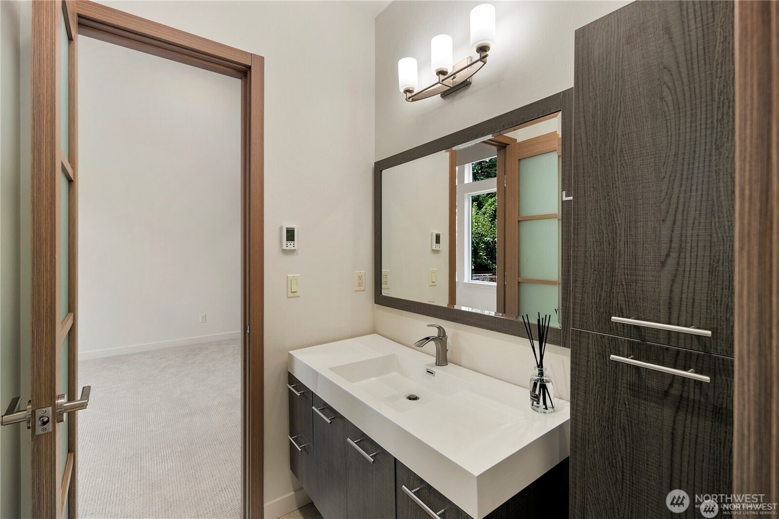 30404 28th Avenue Southwest Federal Way, WA 98023 - Photo 15 of 24 a bathroom with a sink vanity and a mirror