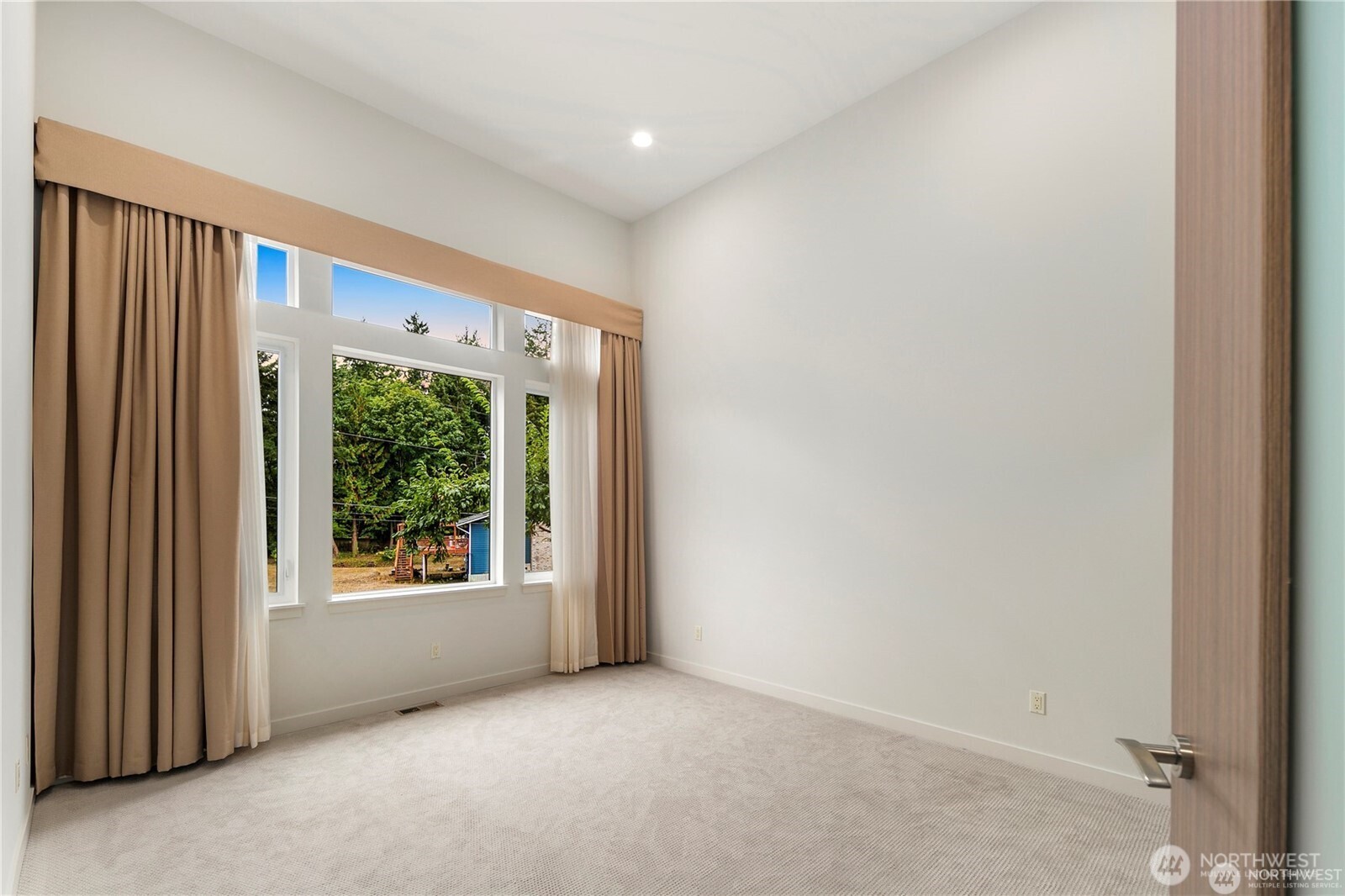 30404 28th Avenue Southwest Federal Way, WA 98023 - Photo 16 of 24 a view of an empty room with a window