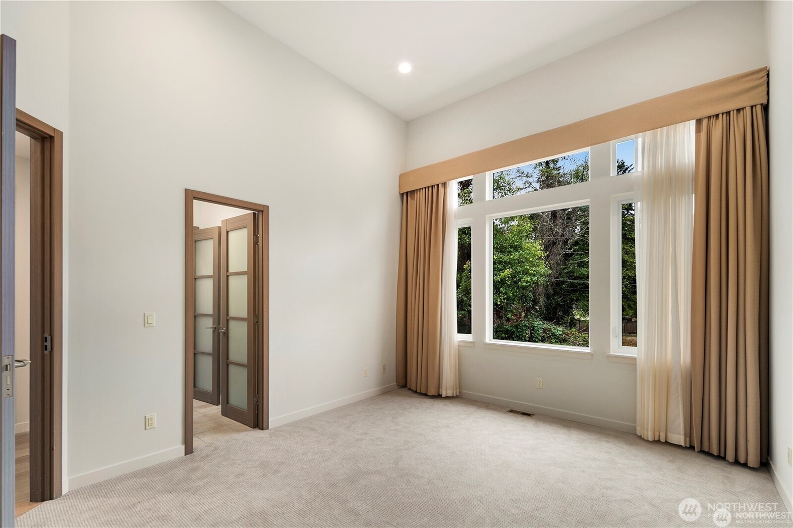 30404 28th Avenue Southwest Federal Way, WA 98023 - Photo 17 of 24 an empty room with windows and closet
