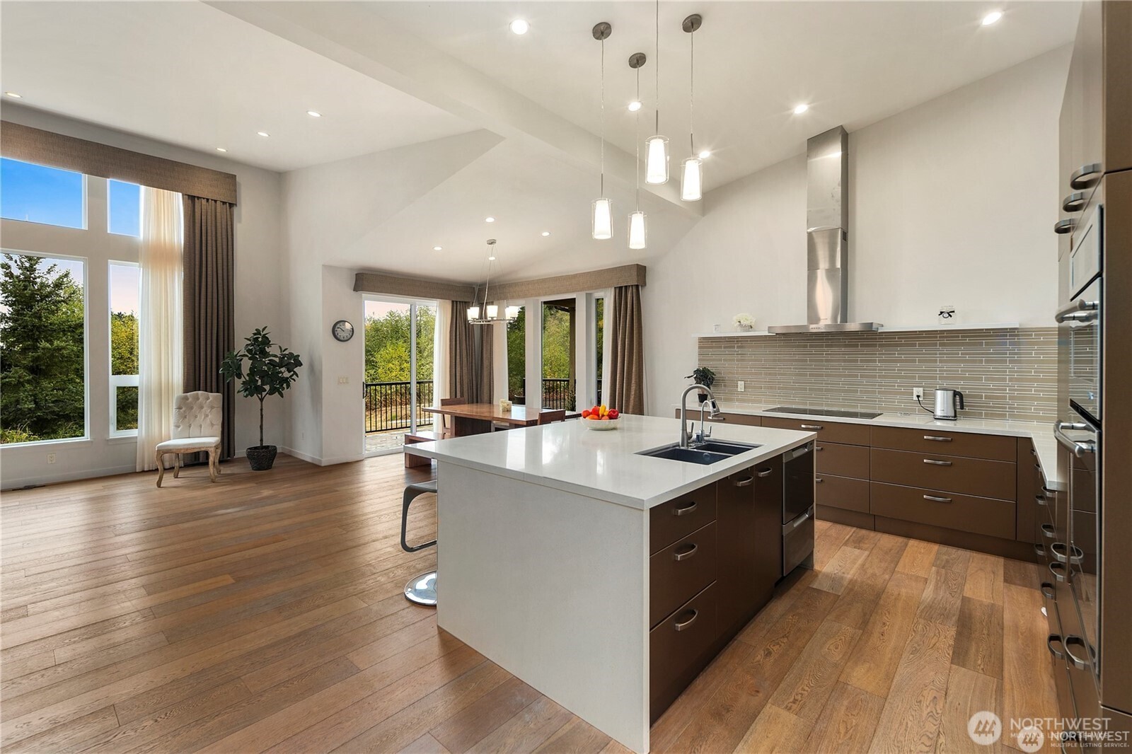 30404 28th Avenue Southwest Federal Way, WA 98023 - Photo 4 of 24 a kitchen with a sink stove and wooden cabinets