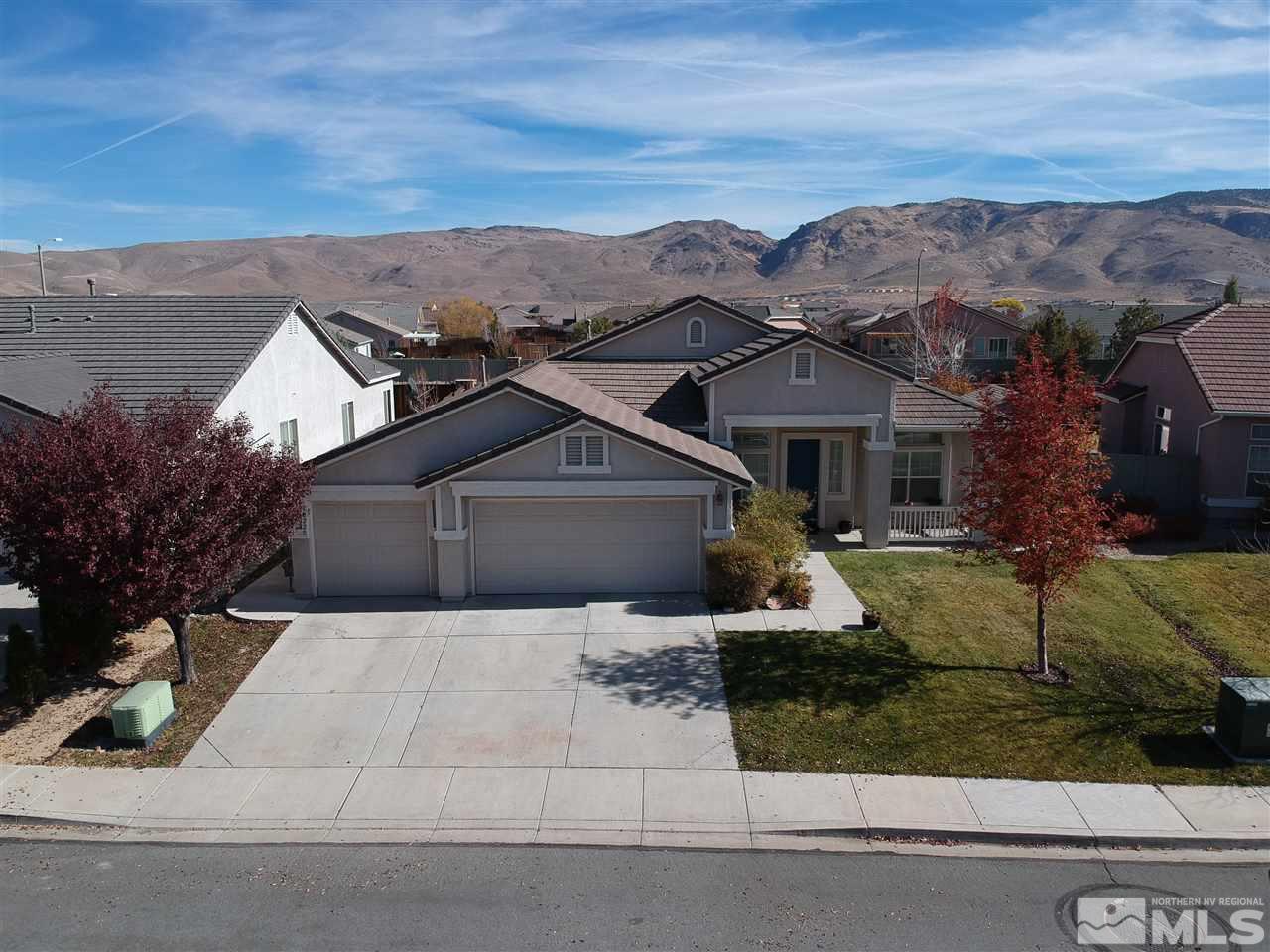 10220 Donnay Court Reno, NV 89521 - Photo 1 of 19 front view of house with a yard