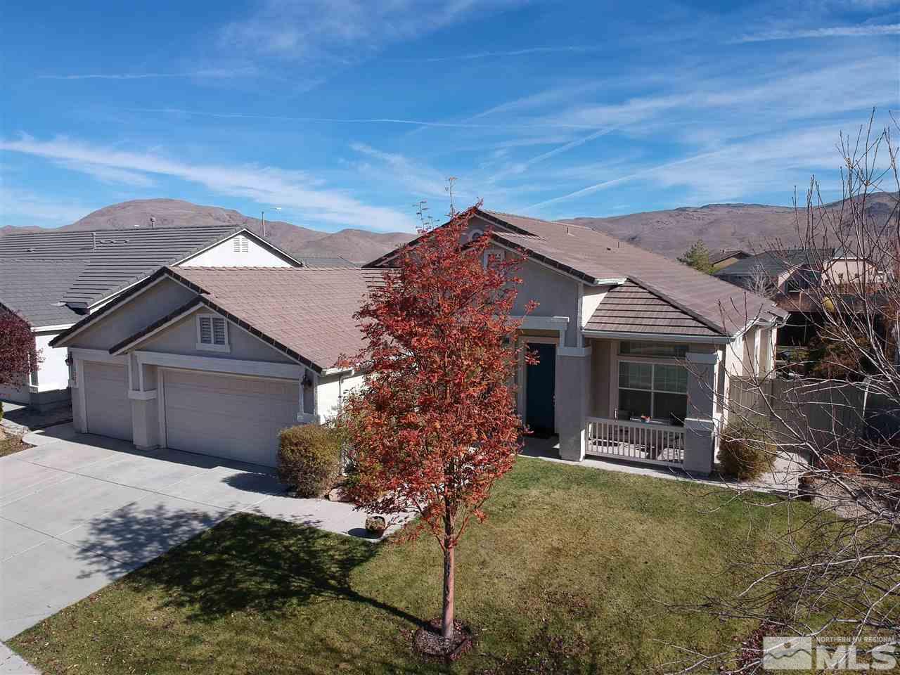 10220 Donnay Court Reno, NV 89521 - Photo 18 of 19 a front view of a house with garden
