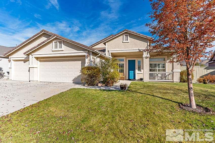 10220 Donnay Court Reno, NV 89521 - Photo 3 of 19 a view of a house with yard and plants