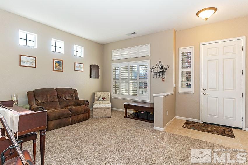 10220 Donnay Court Reno, NV 89521 - Photo 4 of 19 a living room with furniture and a window