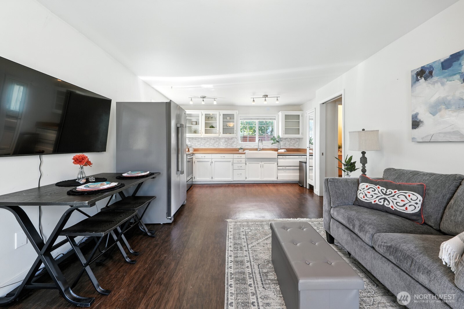 805 36th Street Anacortes, WA 98221 - Photo 12 of 39 a living room with furniture and a flat screen tv