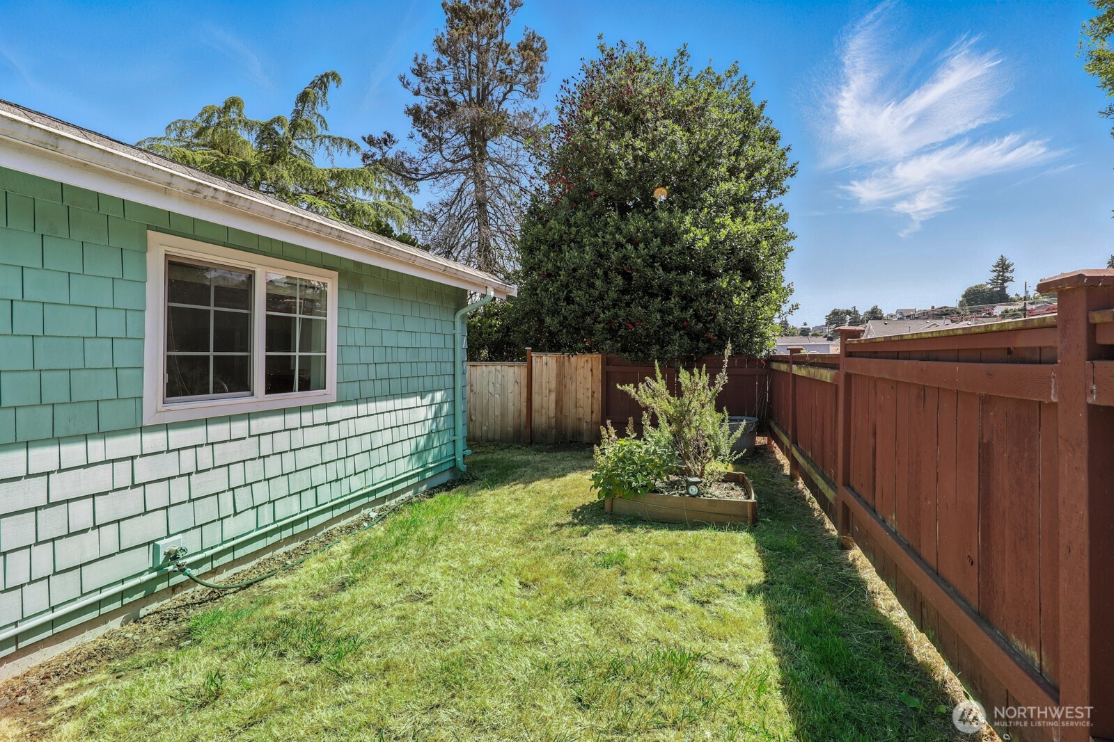 805 36th Street Anacortes, WA 98221 - Photo 18 of 39 a house with a yard