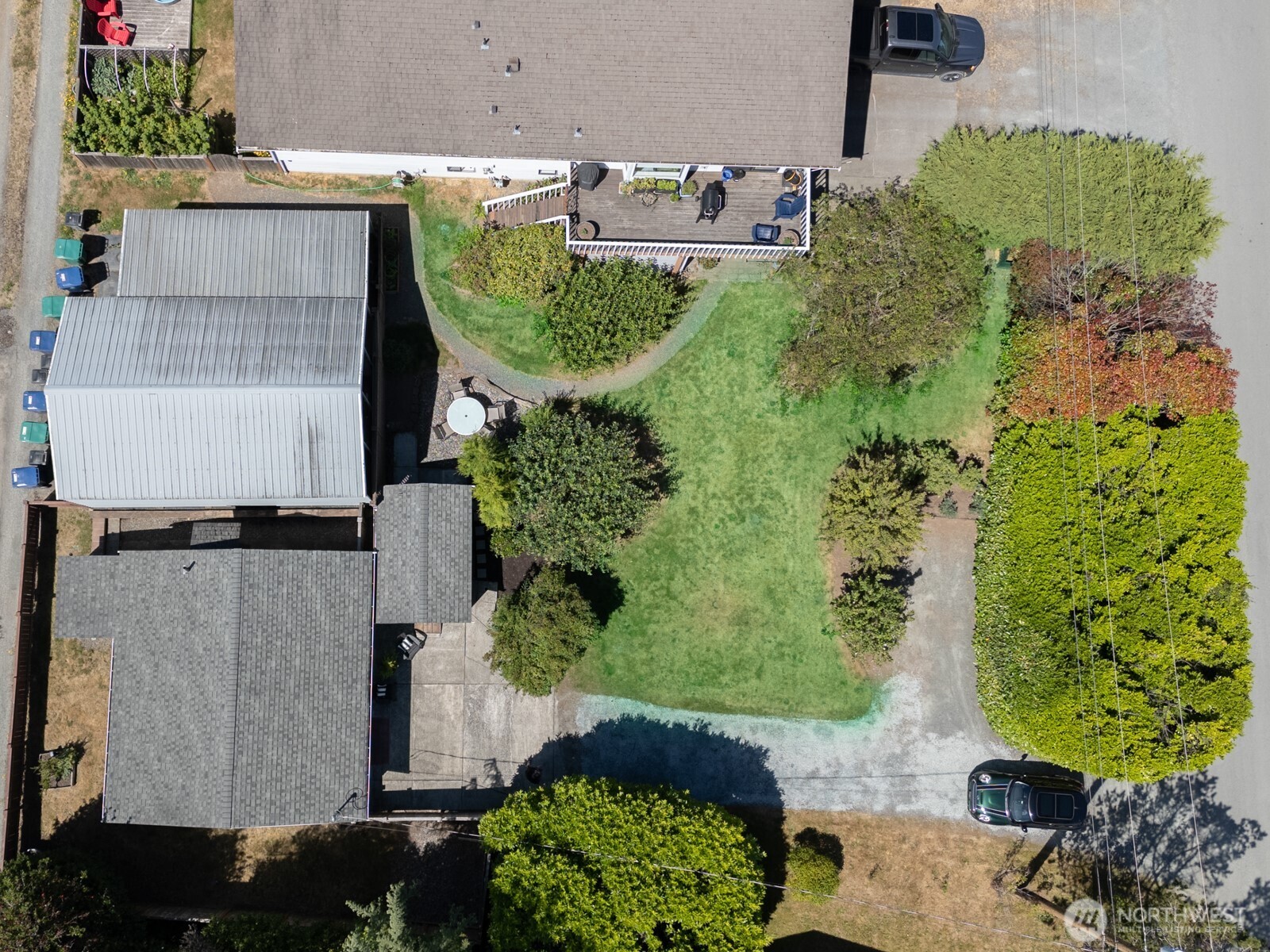 805 36th Street Anacortes, WA 98221 - Photo 27 of 39 an aerial view of a house with a yard and plants