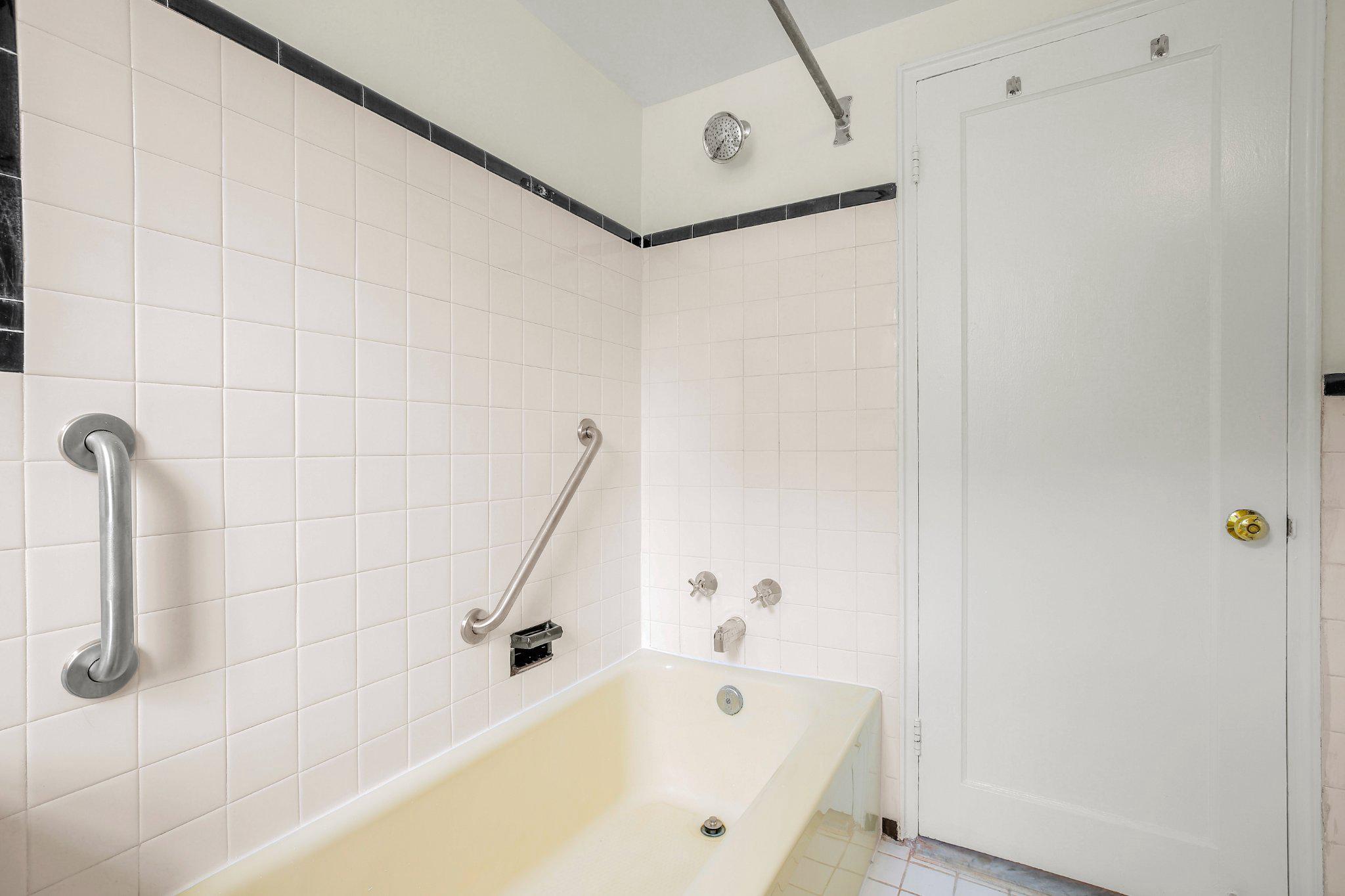 2202 Colston Drive, Unit 102 Silver Spring, MD 20910 - Photo 22 of 38 a bathroom with a bathtub