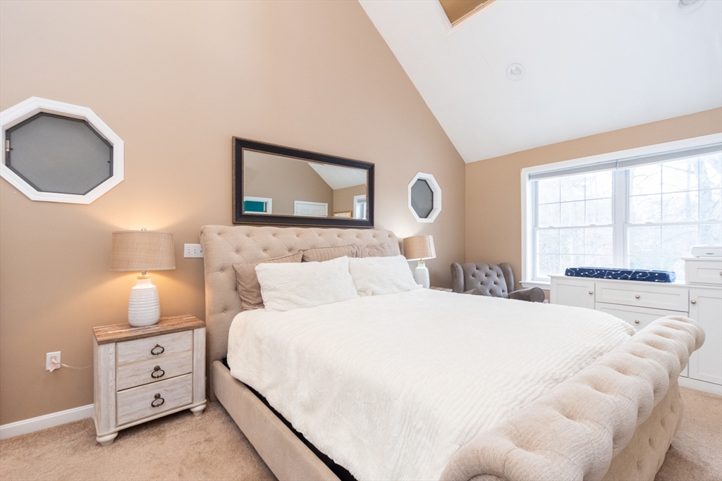 3 Woodruff Road Clinton, MA 01510 - Photo 14 of 22 a bedroom with a bed and a large mirror