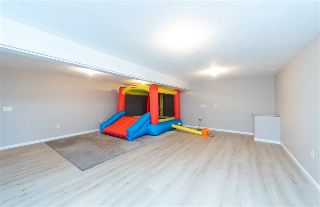 3 Woodruff Road Clinton, MA 01510 - Photo 16 of 22 a view of an empty room with painted walls