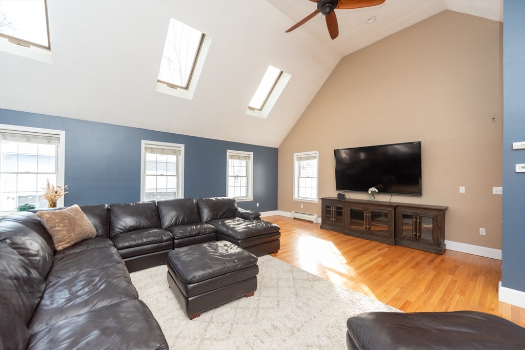 3 Woodruff Road Clinton, MA 01510 - Photo 6 of 22 a living room with furniture and a flat screen tv