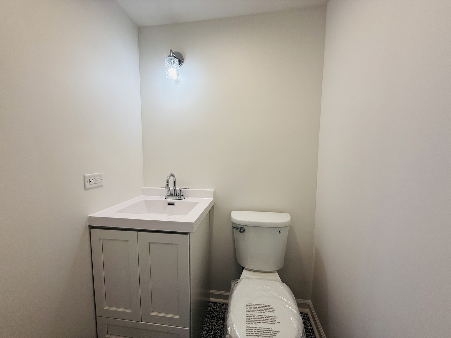 10640 South Johnny Run Road Kinsman, IL 60437 - Photo 11 of 19 a bathroom with a toilet sink and mirror