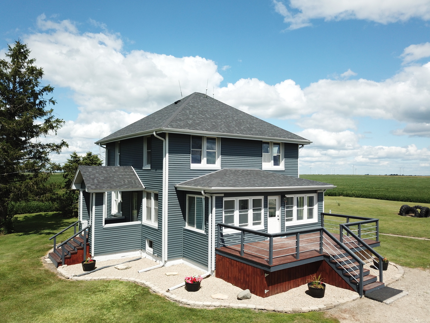 10640 South Johnny Run Road Kinsman, IL 60437 - Photo 18 of 19 a view of a house with backyard porch and sitting area