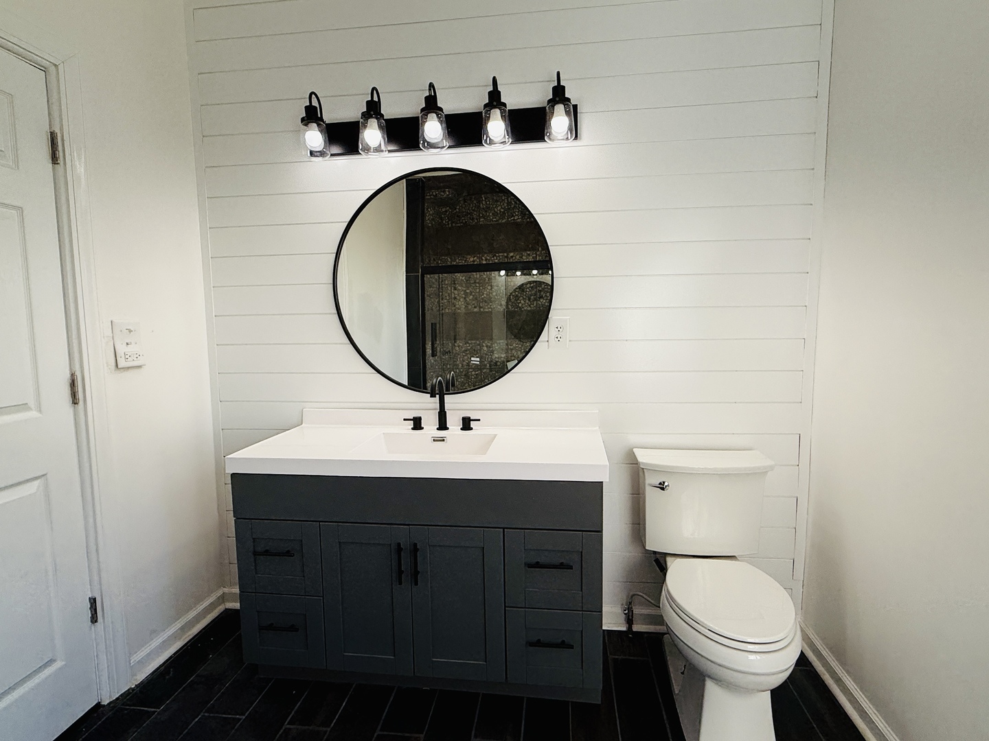 10640 South Johnny Run Road Kinsman, IL 60437 - Photo 8 of 19 a bathroom with a toilet a sink and a mirror